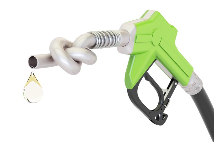 Energy,Crisis,Concept.,Gas,Pump,Nozzle,Tied,In,A,Knot,