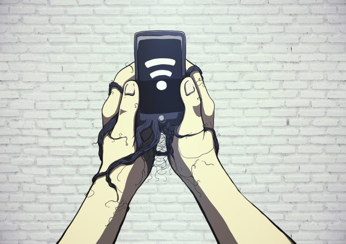 Creative,Sketch,Of,Smartphone,Roots,Wrapped,Around,Male,Hands,On Akıllı aygıtları tutsağı gençlik: Ne yaşıyorlar, neden çok zordalar?