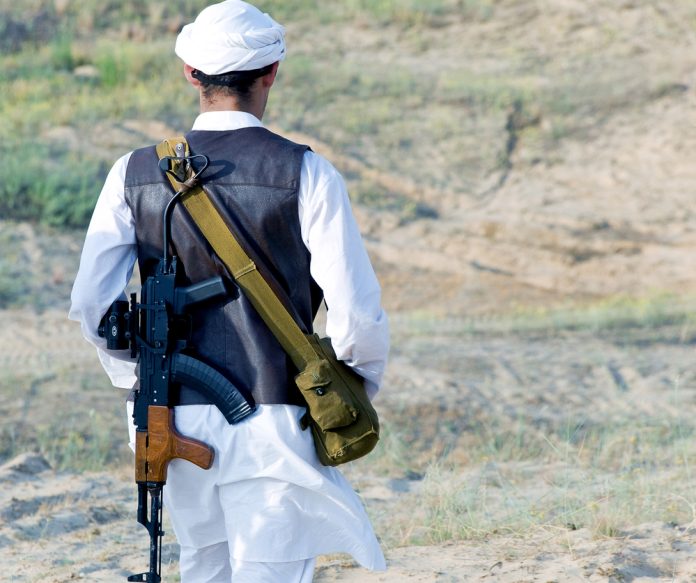 Muslim,Rebel,With,Rifle Taliban