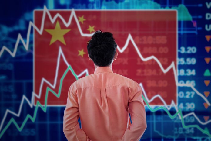 Trade,War,Concept:,Young,Male,Broker,Looking,At,A,Stock Çin ekonomisinin sorunu ne?